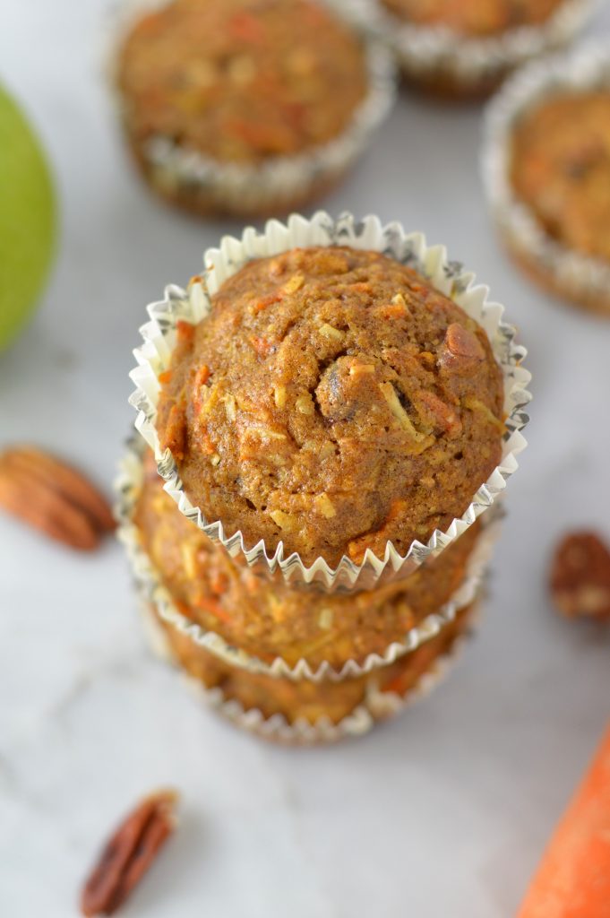  These Carrot, Apple and Pecan Muffins are sweetened with shredded coconut, dried cranberries and brown sugar. A healthy grab and go breakfast recipe.