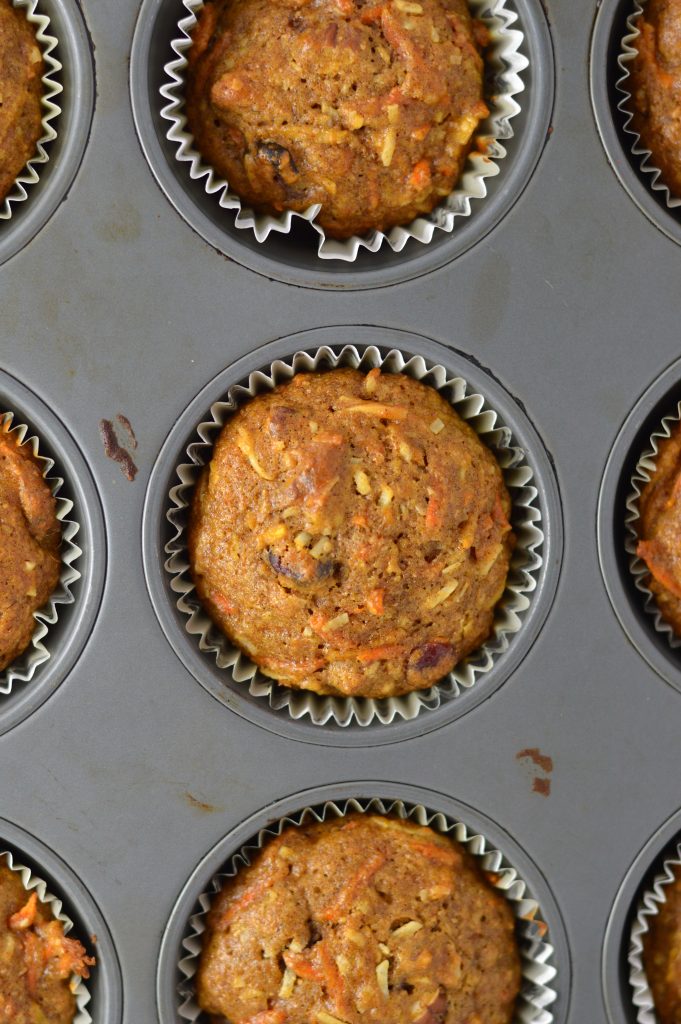  These Carrot, Apple and Pecan Muffins are sweetened with shredded coconut, dried cranberries and brown sugar. A healthy grab and go breakfast recipe.