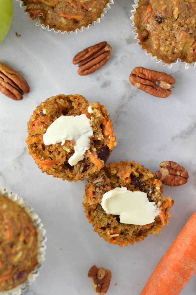  These Carrot, Apple and Pecan Muffins are sweetened with shredded coconut, dried cranberries and brown sugar. A healthy grab and go breakfast recipe.