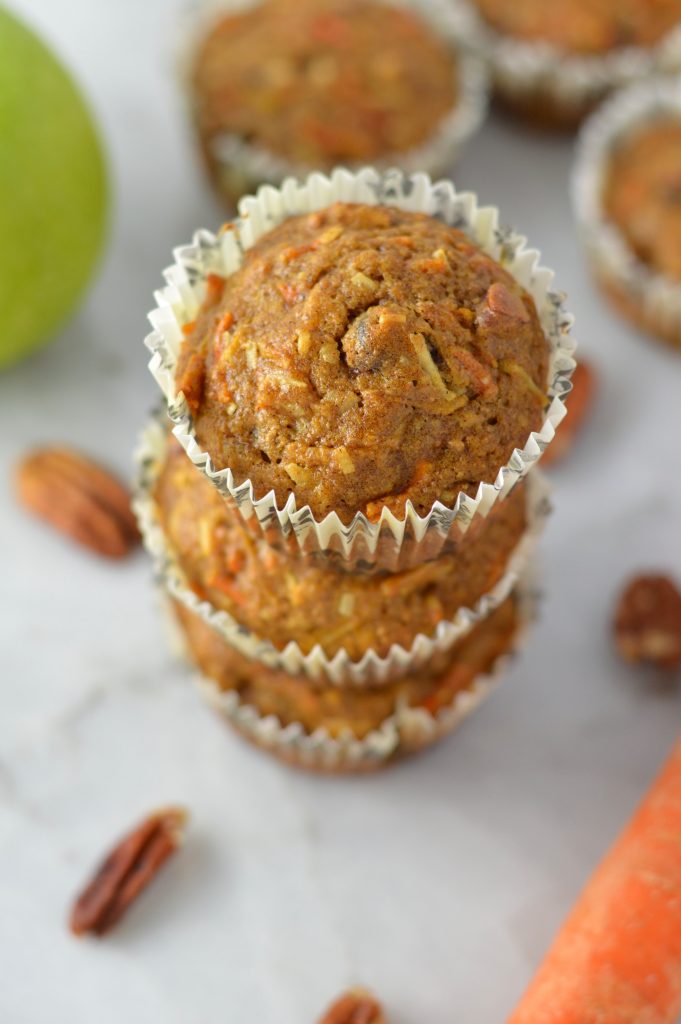  These Carrot, Apple and Pecan Muffins are sweetened with shredded coconut, dried cranberries and brown sugar. A healthy grab and go breakfast recipe.