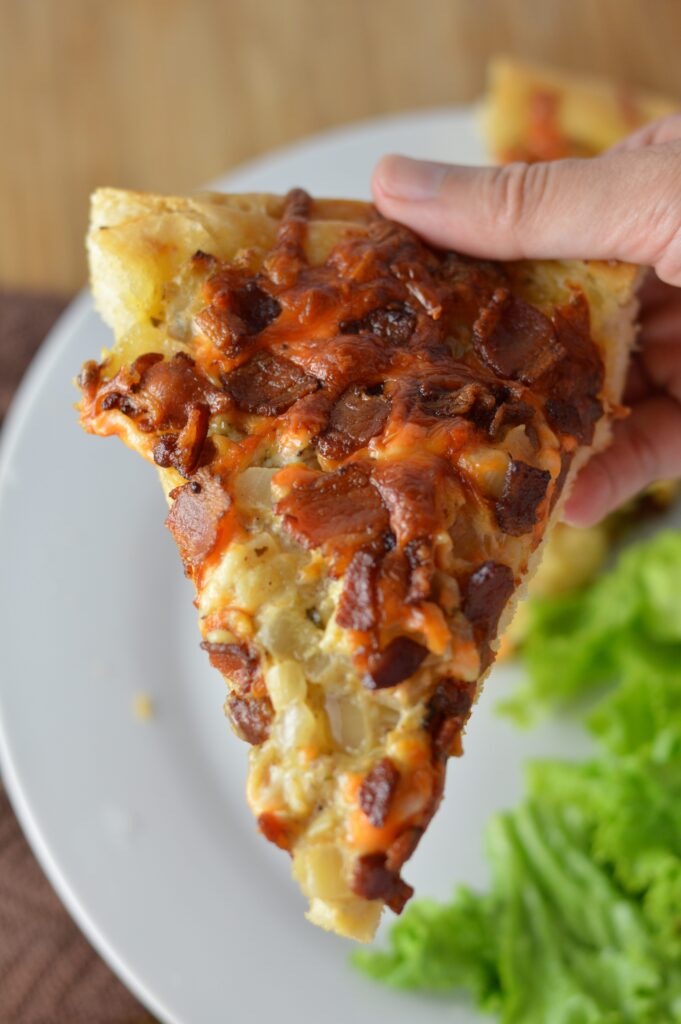 Deep dish Bacon Pizza recipe made in a cast iron skillet. One of my favourite ways to eat pizza, perfect for a weeknight dinner idea.