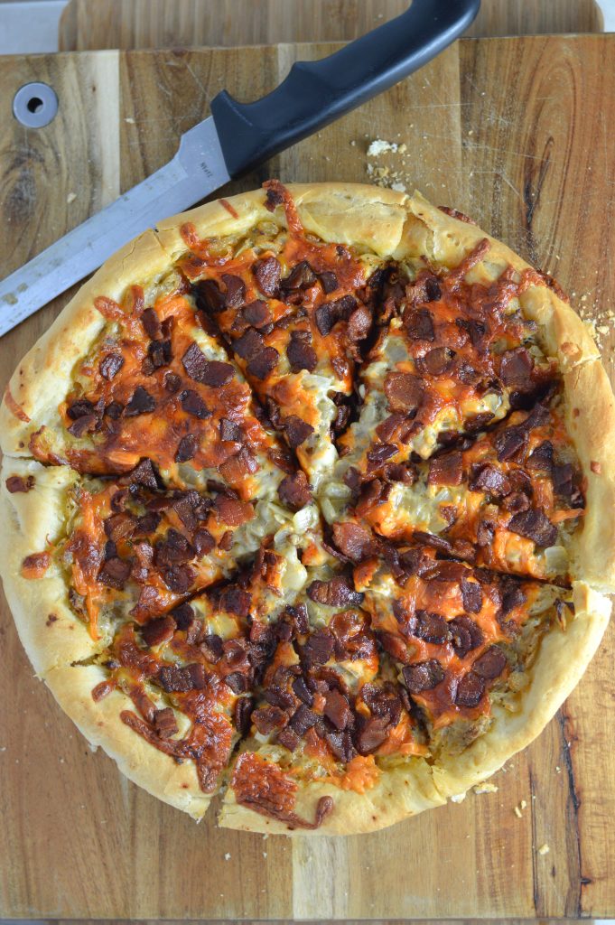 Deep dish Bacon Pizza recipe made in a cast iron skillet. One of my favourite ways to eat pizza, perfect for a weeknight dinner idea.