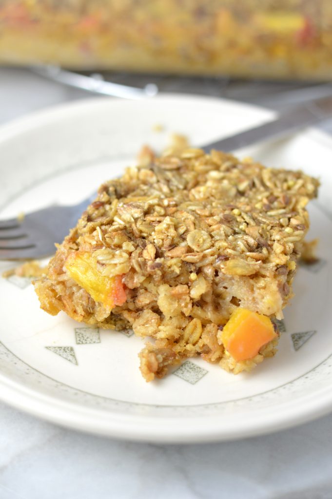 This Ginger Peach Baked Oatmeal is the perfect recipe idea for breakfast. Ready in 30 minutes. Best when topped with yogurt and coconut chips.