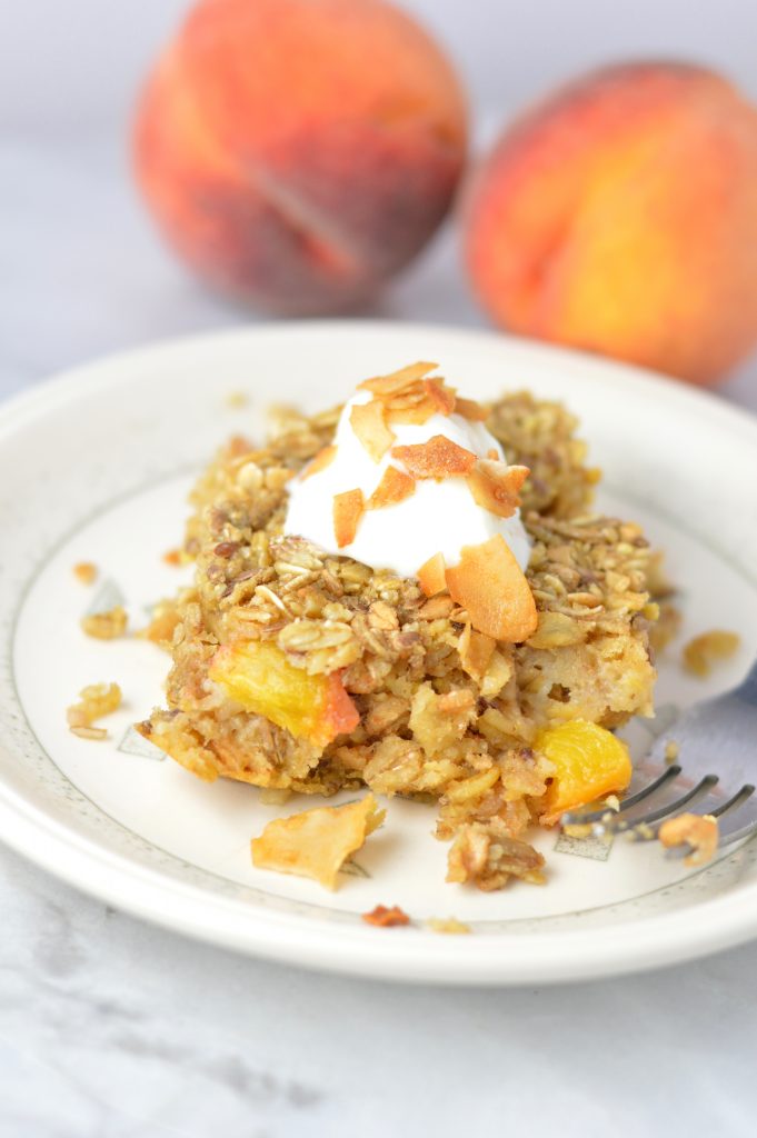 This Ginger Peach Baked Oatmeal is the perfect recipe idea for breakfast. Ready in 30 minutes. Best when topped with yogurt and coconut chips.