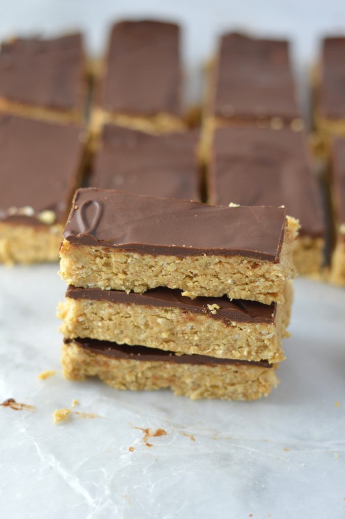 Homemade No Bake Oat and Chocolate Protein Bars made with peanut butter and rice krispie cereal. Vegan, and can be made gluten free.