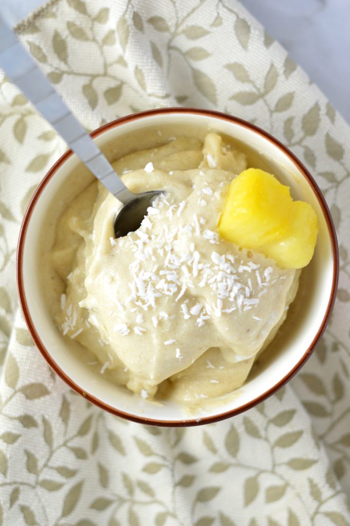 Easy 4 ingredient Pina Colada Nice Cream that is ready in under 5 minutes. It's a banana ice cream, so it is vegan, gluten free and paleo.