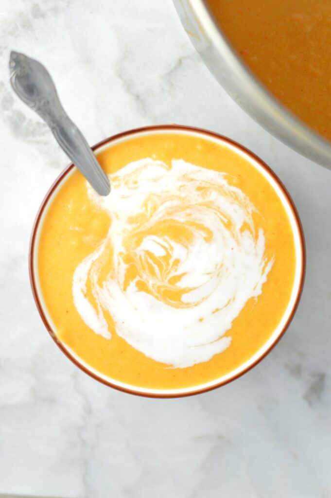 Vegan Sweet Potato Cauliflower Soup made with coconut milk. This recipe is so smooth and creamy, it is guilt free comfort food.