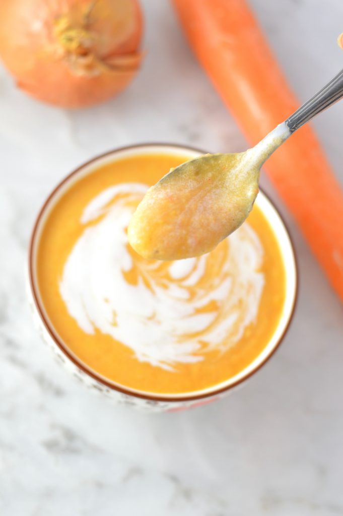 Vegan Sweet Potato Cauliflower Soup made with coconut milk. This recipe is so smooth and creamy, it is guilt free comfort food.