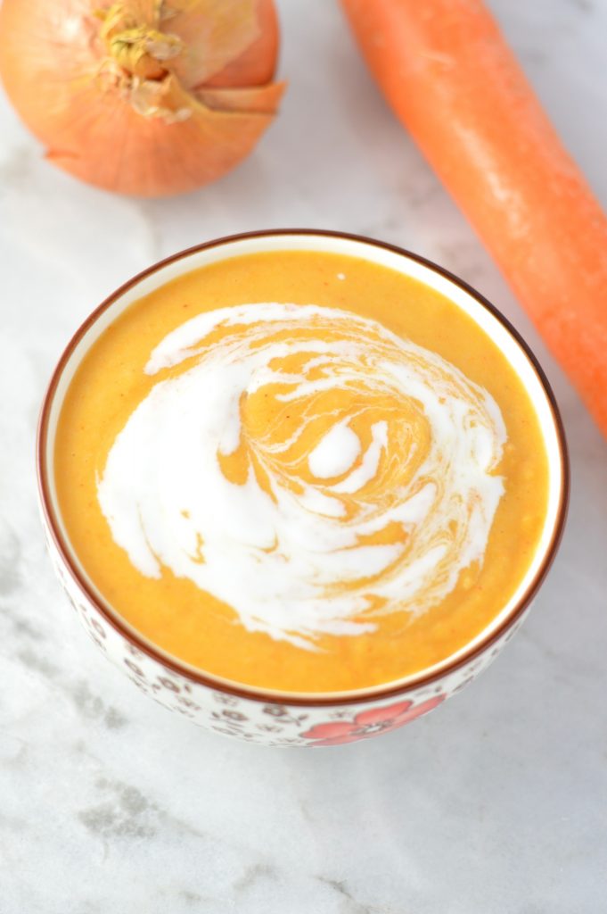 Vegan Sweet Potato Cauliflower Soup made with coconut milk. This recipe is so smooth and creamy, it is guilt free comfort food.