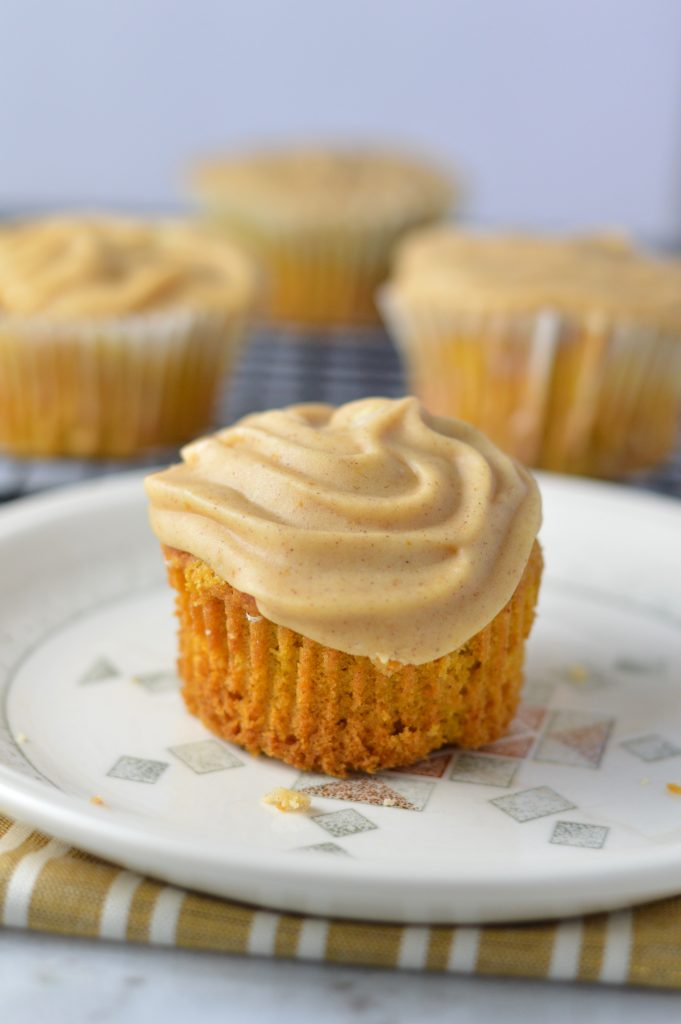 Pumpkin Spice Cupcakes recipe with pumpkin cinnamon cream cheese frosting. Super easy to make, this is a great fall dessert idea.