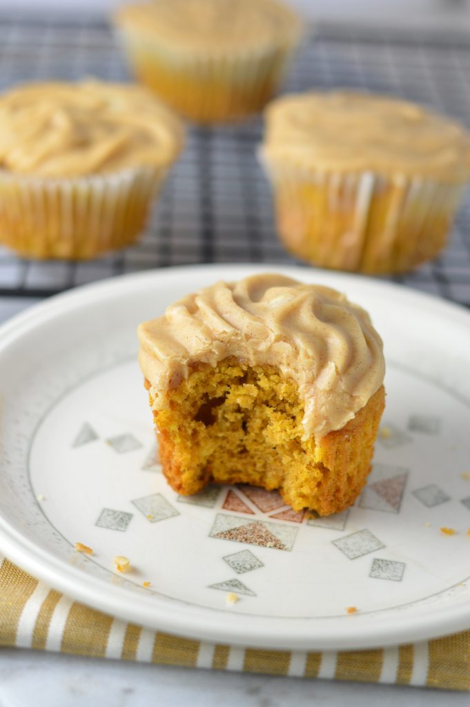 Pumpkin Spice Cupcakes recipe with pumpkin cinnamon cream cheese frosting. Super easy to make, this is a great fall dessert idea.