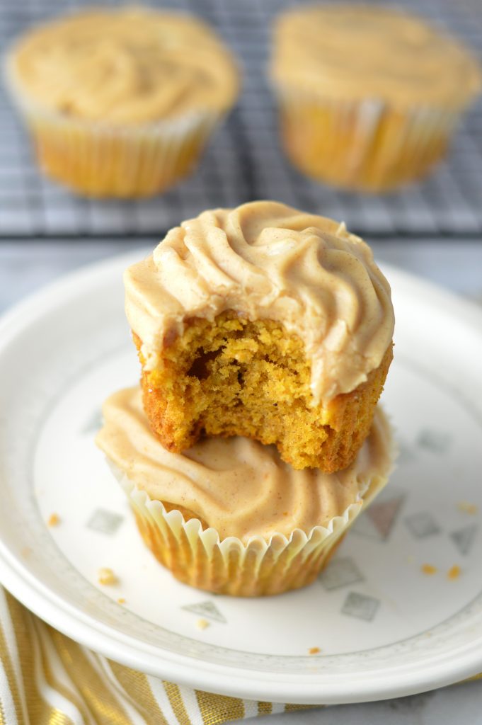 Pumpkin Spice Cupcakes recipe with pumpkin cinnamon cream cheese frosting. Super easy to make, this is a great fall dessert idea.