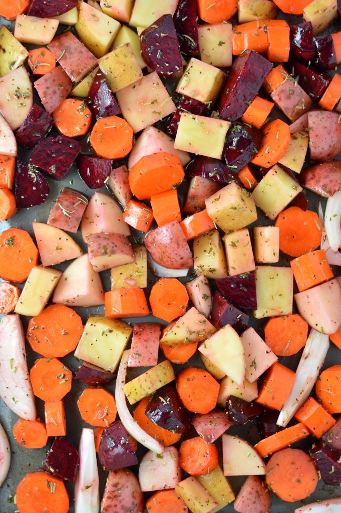 This Roasted Potatoes, Carrots and Beets recipe is the perfect way to roast your root vegetables. Seasoned with balsamic vinegar and rosemary.