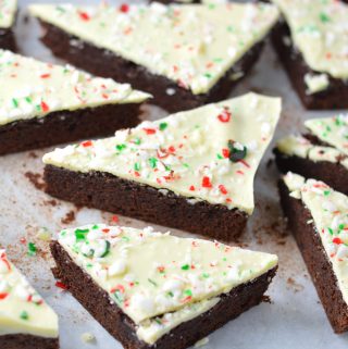 These Peppermint Bark Brownies are the perfect dessert recipe for Christmas. Soft and chewy brownies with a hard white chocolate shell topped with crushed candy canes.