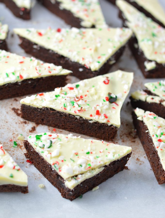 These Peppermint Bark Brownies are the perfect dessert recipe for Christmas. Soft and chewy brownies with a hard white chocolate shell topped with crushed candy canes.