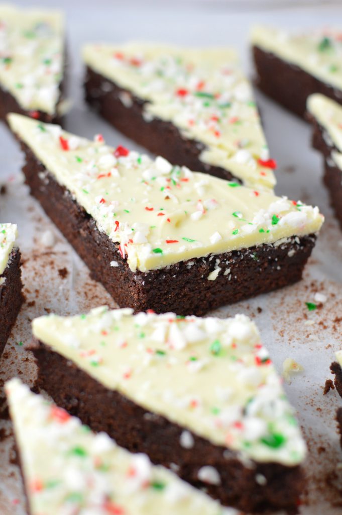 These Peppermint Bark Brownies are the perfect dessert recipe for Christmas. Soft and chewy brownies with a hard white chocolate shell topped with crushed candy canes.