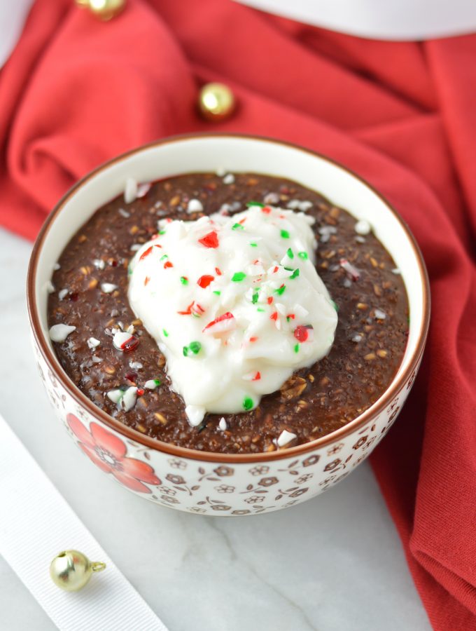 Peppermint Mocha Oatmeal makes for a warm and comforting breakfast recipe for the holidays. topped with yogurt and crushed candy canes.