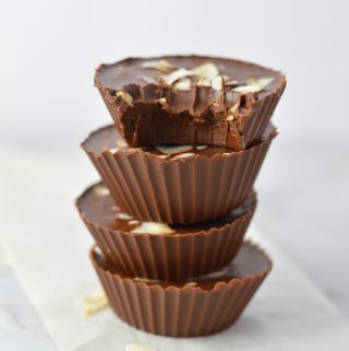 3 Ingredient Chocolate Peanut Butter Coconut Cups recipe makes for a quick and easy dessert idea. Made with coconut oil and topped with coconut chips,