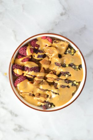 This Fruit, Figs and Peanut Butter Coffee Oatmeal recipe is the perfect way to get in your caffeine in the morning. The frozen berries, chia seeds and figs come together perfectly in this easy breakfast bowl.