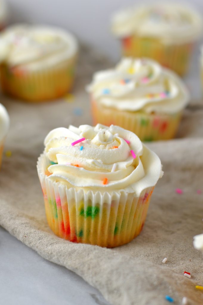 Easy Funfetti Cupcakes recipe. Birthday cake flavoured cupcakes filled with sprinkles and topped with the best buttercream. Perfect birthday dessert idea.