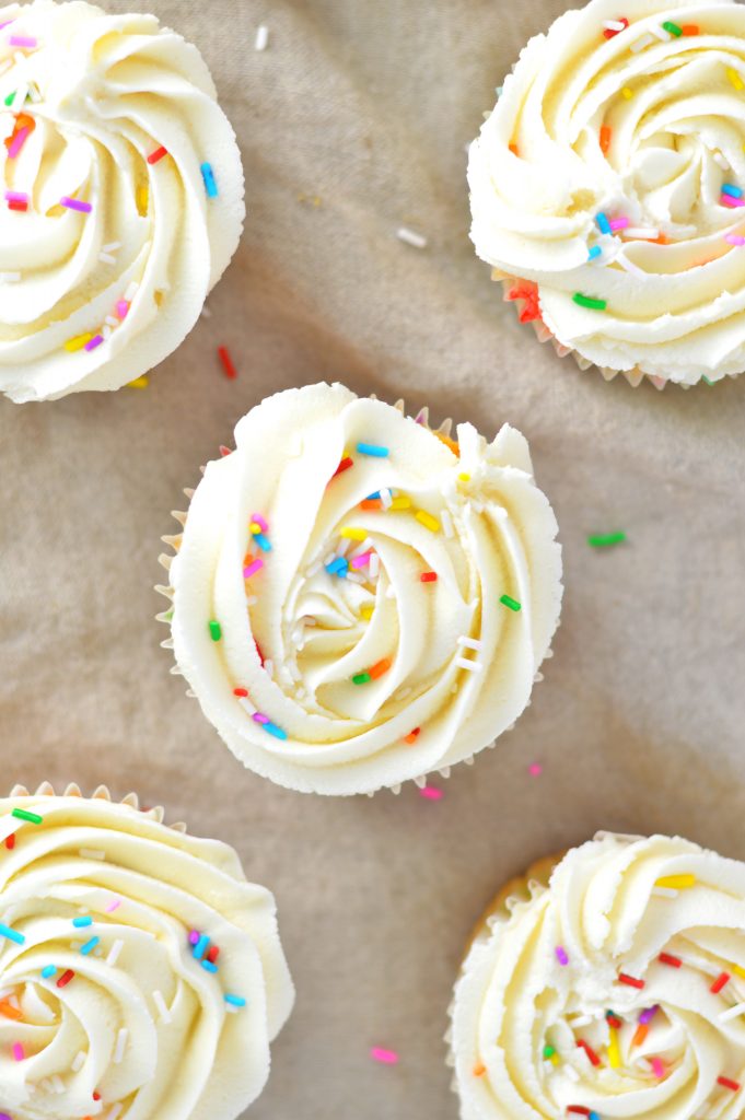 Easy Funfetti Cupcakes recipe. Birthday cake flavoured cupcakes filled with sprinkles and topped with the best buttercream. Perfect birthday dessert idea.