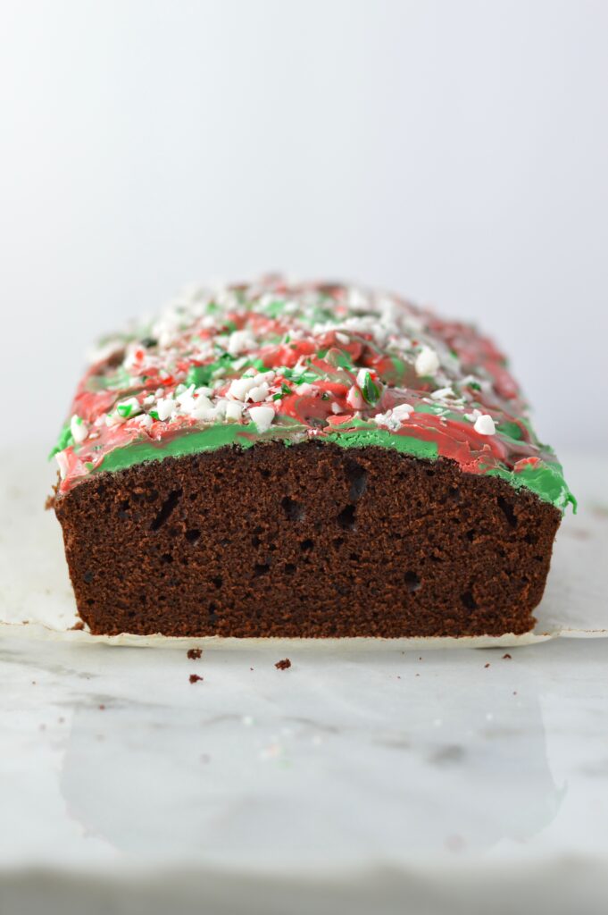 Peppermint Bark Chocolate Bread recipe is basically a cake with melted chocolate and crushed candy canes on top. The perfect dessert for Christmas.