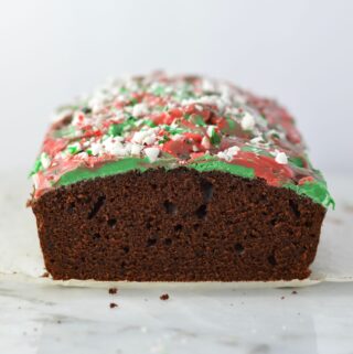 Peppermint Bark Chocolate Bread recipe is basically a cake with melted chocolate and crushed candy canes on top. The perfect dessert for Christmas.