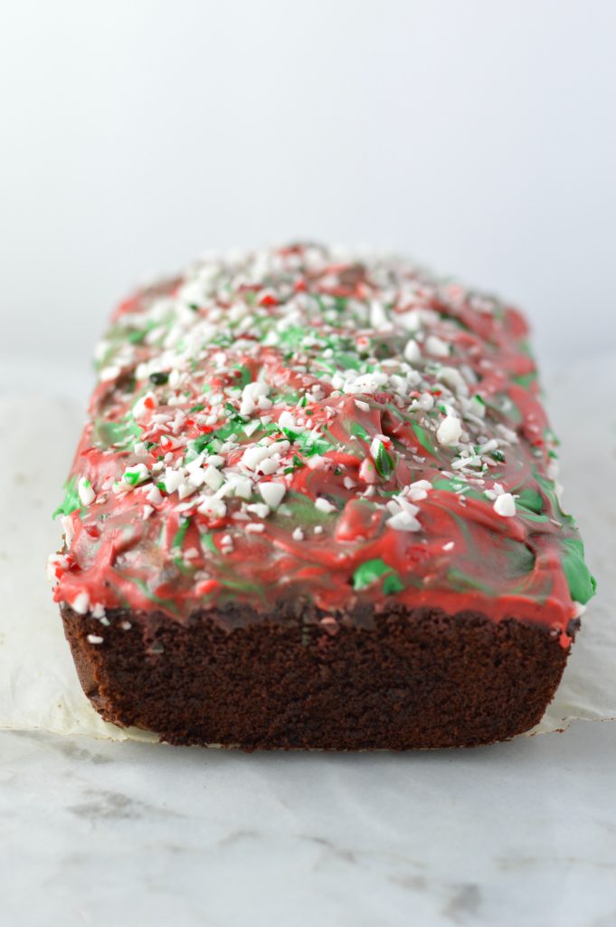 Peppermint Bark Chocolate Bread recipe is basically a cake with melted chocolate and crushed candy canes on top. The perfect dessert for Christmas.