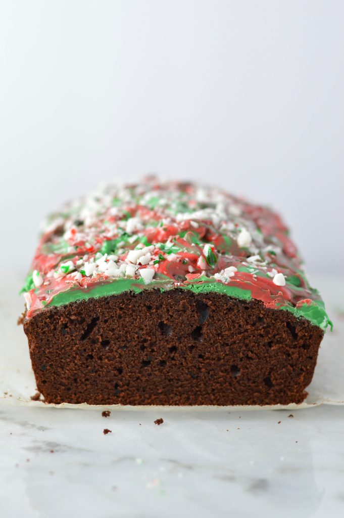 Peppermint Bark Chocolate Bread recipe is basically a cake with melted chocolate and crushed candy canes on top. The perfect dessert for Christmas.