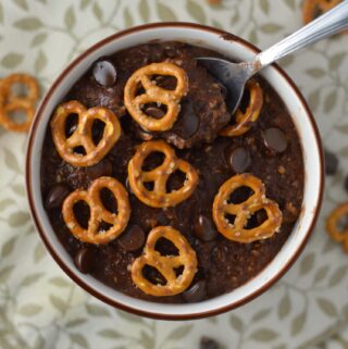 Pretzel Topped Brownie Oatmeal recipe is a quick and easy breakfast idea to keep you full until lunch. So rich and decadent, it feels like dessert without the guilt.