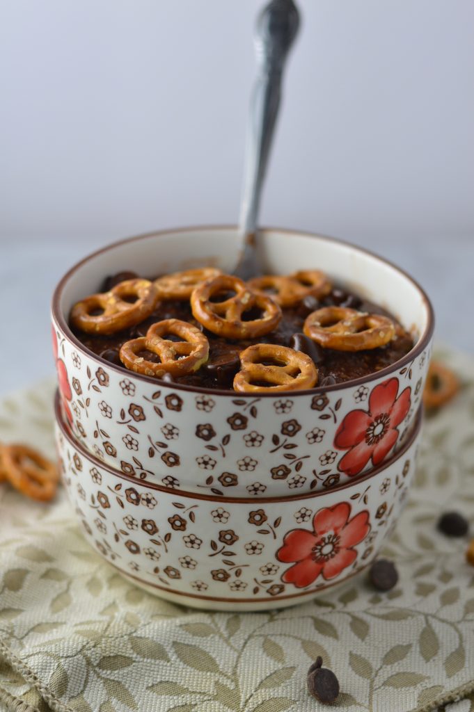 Pretzel Topped Brownie Oatmeal recipe is a quick and easy breakfast idea to keep you full until lunch. So rich and decadent, it feels like dessert without the guilt.