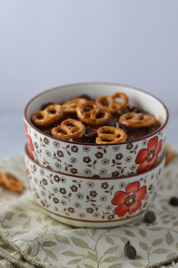 Pretzel Topped Brownie Oatmeal recipe is a quick and easy breakfast idea to keep you full until lunch. So rich and decadent, it feels like dessert without the guilt.