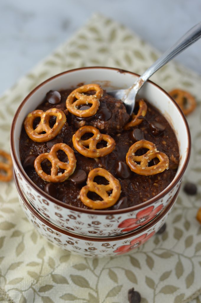 Pretzel Topped Brownie Oatmeal recipe is a quick and easy breakfast idea to keep you full until lunch. So rich and decadent, it feels like dessert without the guilt.