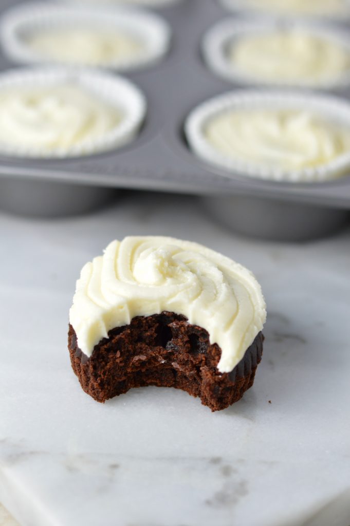 Simple Vegan Chocolate Cupcakes with Vanilla Buttercream recipe that tastes just as good as your regular cupcake. Dense and fudgy, this makes an easy and tasty dessert.