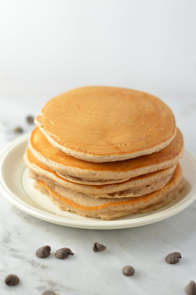 Easy Chocolate Protein Powder Pancakes recipe that can be made vegan. These are so quick to make, and so soft and fluffy. Perfect breakfast or brunch idea.