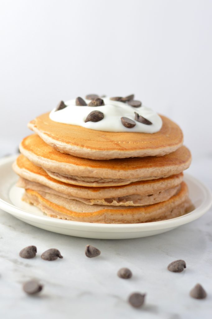 Easy Chocolate Protein Powder Pancakes recipe that can be made vegan. These are so quick to make, and so soft and fluffy. Perfect breakfast or brunch idea.