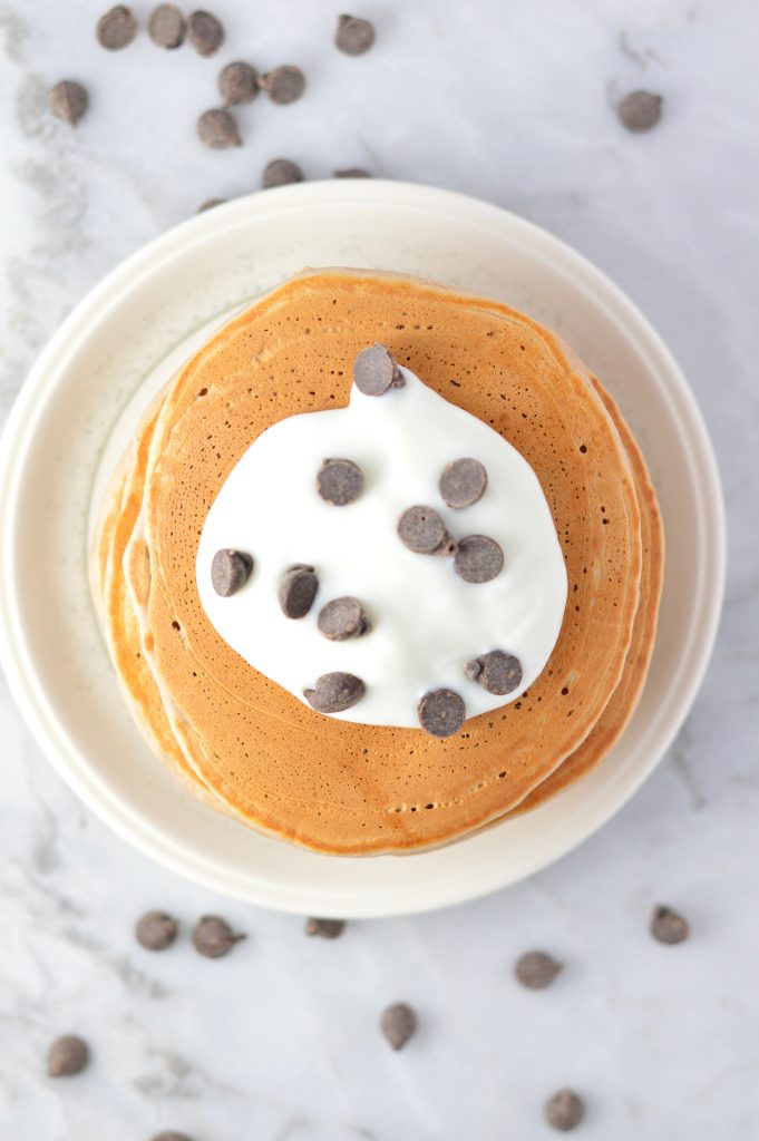 Easy Chocolate Protein Powder Pancakes recipe that can be made vegan. These are so quick to make, and so soft and fluffy. Perfect breakfast or brunch idea.