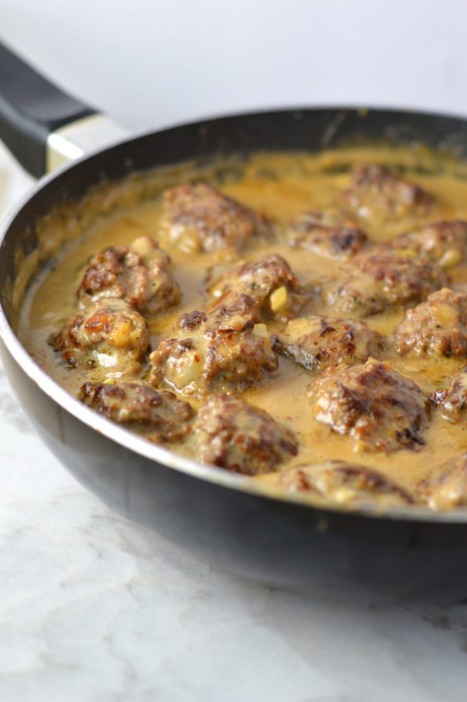 This Easy Meatballs in Dijon Gravy recipe is the perfect quick and simple weeknight dinner idea. The mustard sauce brings this dish to the next level!