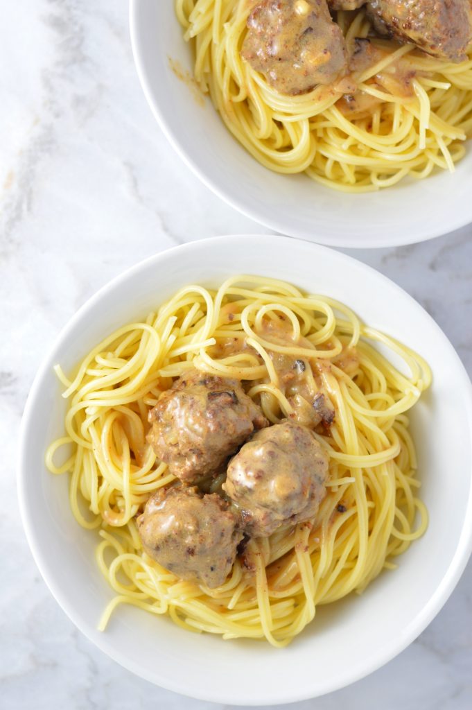 This Easy Meatballs in Dijon Gravy recipe is the perfect quick and simple weeknight dinner idea. The mustard sauce brings this dish to the next level!