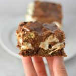 These Peanut Butter Smores Layered Brownies are in instant hit. This will be your new go-to brownie recipe for when you want a quick and easy dessert that looks fancy!