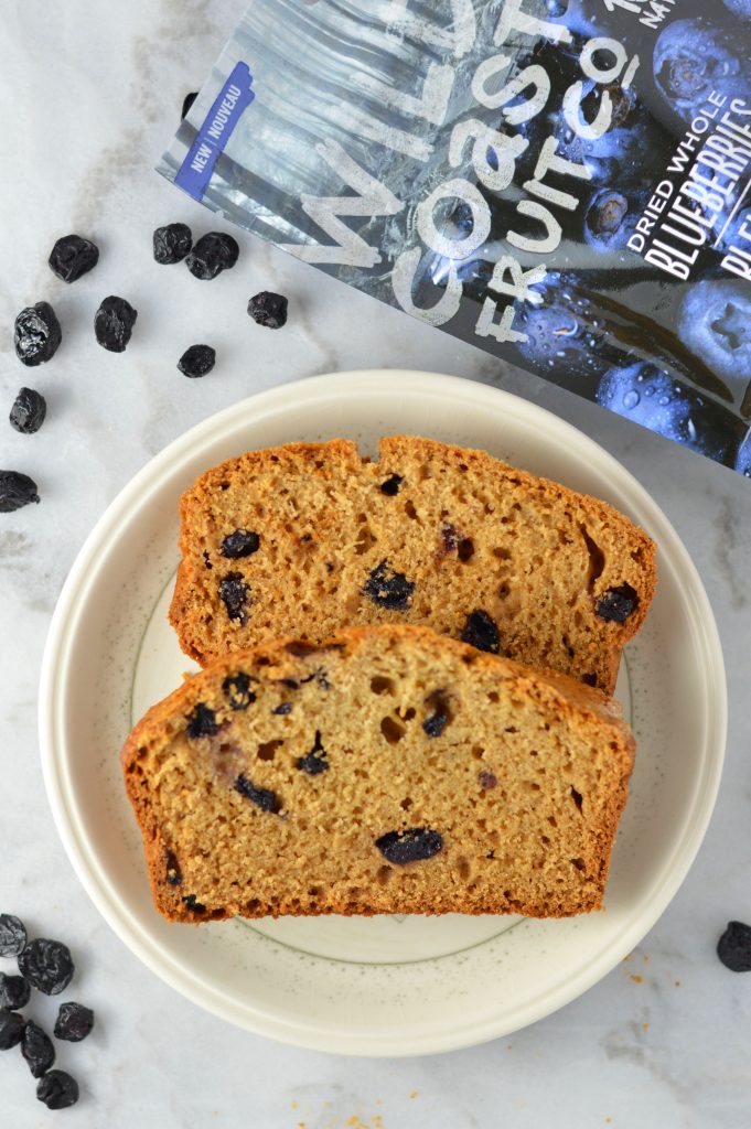 Easy Blueberry Applesauce Bread recipe. Super simple breakfast or nut free snack idea, and made with cinnamon and dried blueberries.