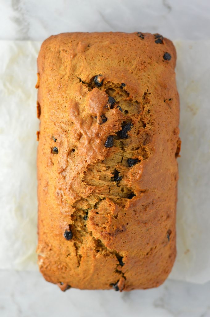 Easy Blueberry Applesauce Bread recipe. Super simple breakfast or nut free snack idea, and made with cinnamon and dried blueberries.