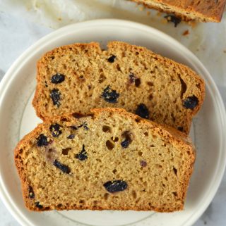 Easy Blueberry Applesauce Bread recipe. Super simple breakfast or nut free snack idea, and made with cinnamon and dried blueberries.