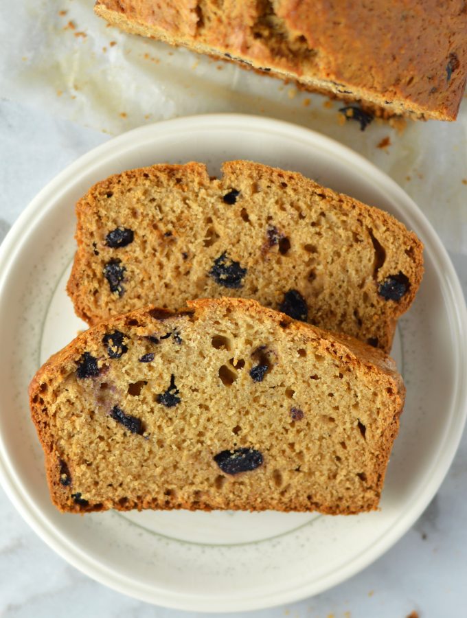 Easy Blueberry Applesauce Bread recipe. Super simple breakfast or nut free snack idea, and made with cinnamon and dried blueberries.