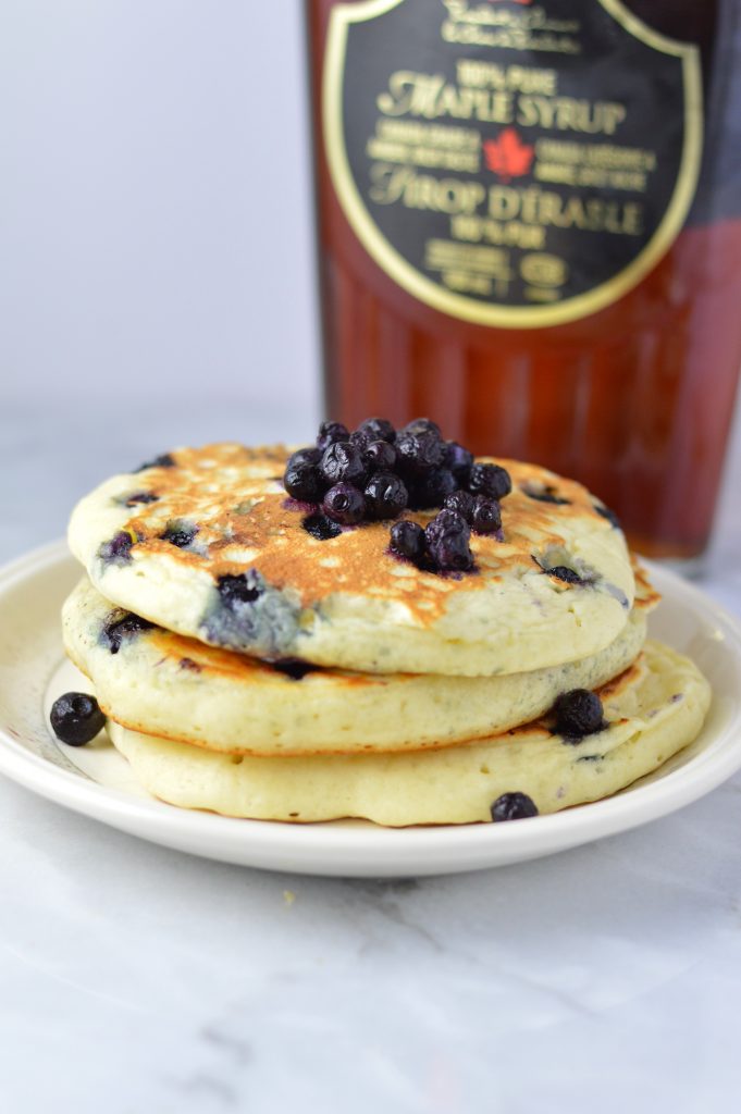 Fluffy Blueberry Pancakes recipe made with fresh blueberries. So easy to make, and somewhat healthy, they make a delicious filling breakfast idea.