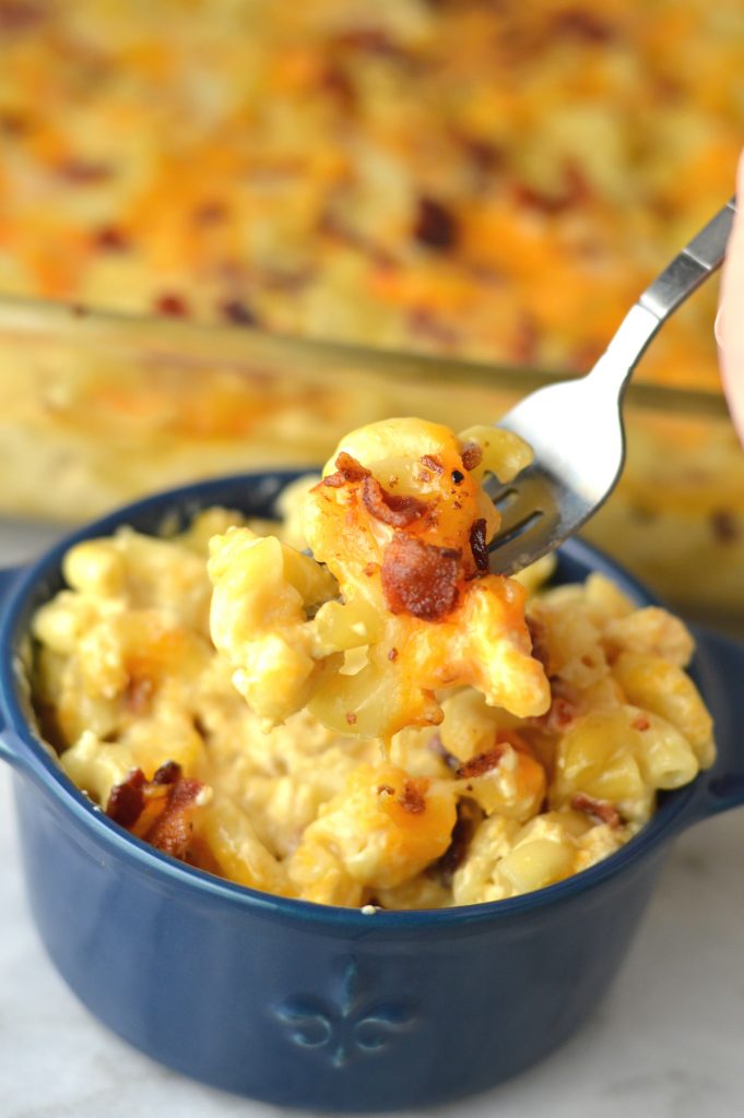 Creamy Baked Bacon Macaroni and Cheese that is so easy to make. My favourite weeknight dinner recipe idea made with cheddar and mozzarella.