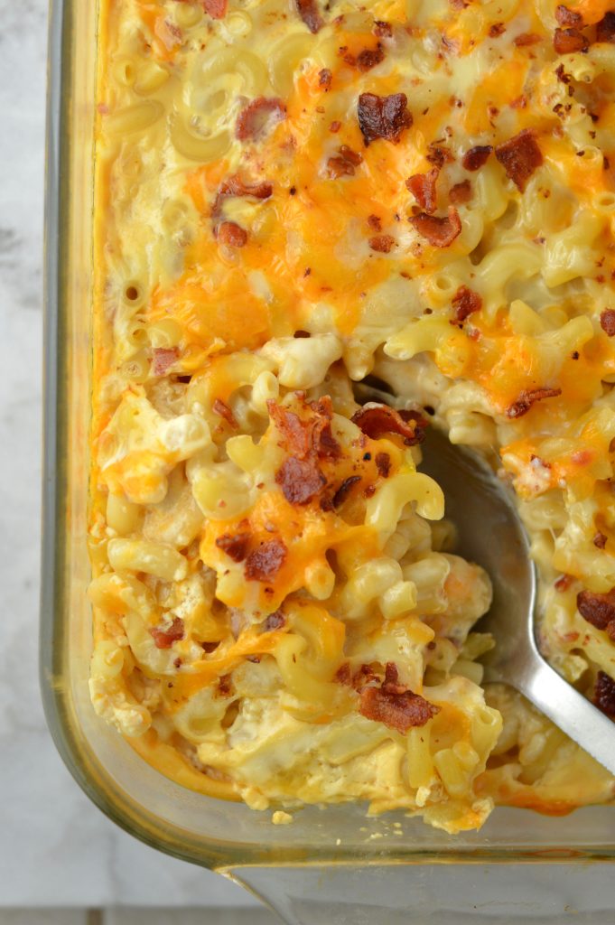 Creamy Baked Bacon Macaroni and Cheese that is so easy to make. My favourite weeknight dinner recipe idea made with cheddar and mozzarella.