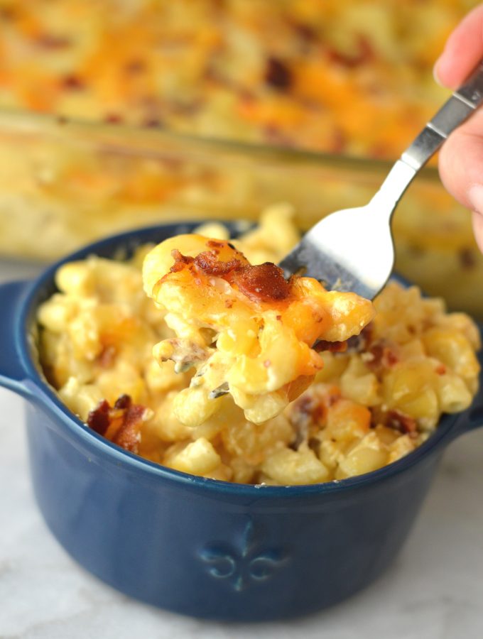 Creamy Baked Bacon Macaroni and Cheese that is so easy to make. My favourite weeknight dinner recipe idea made with cheddar and mozzarella.