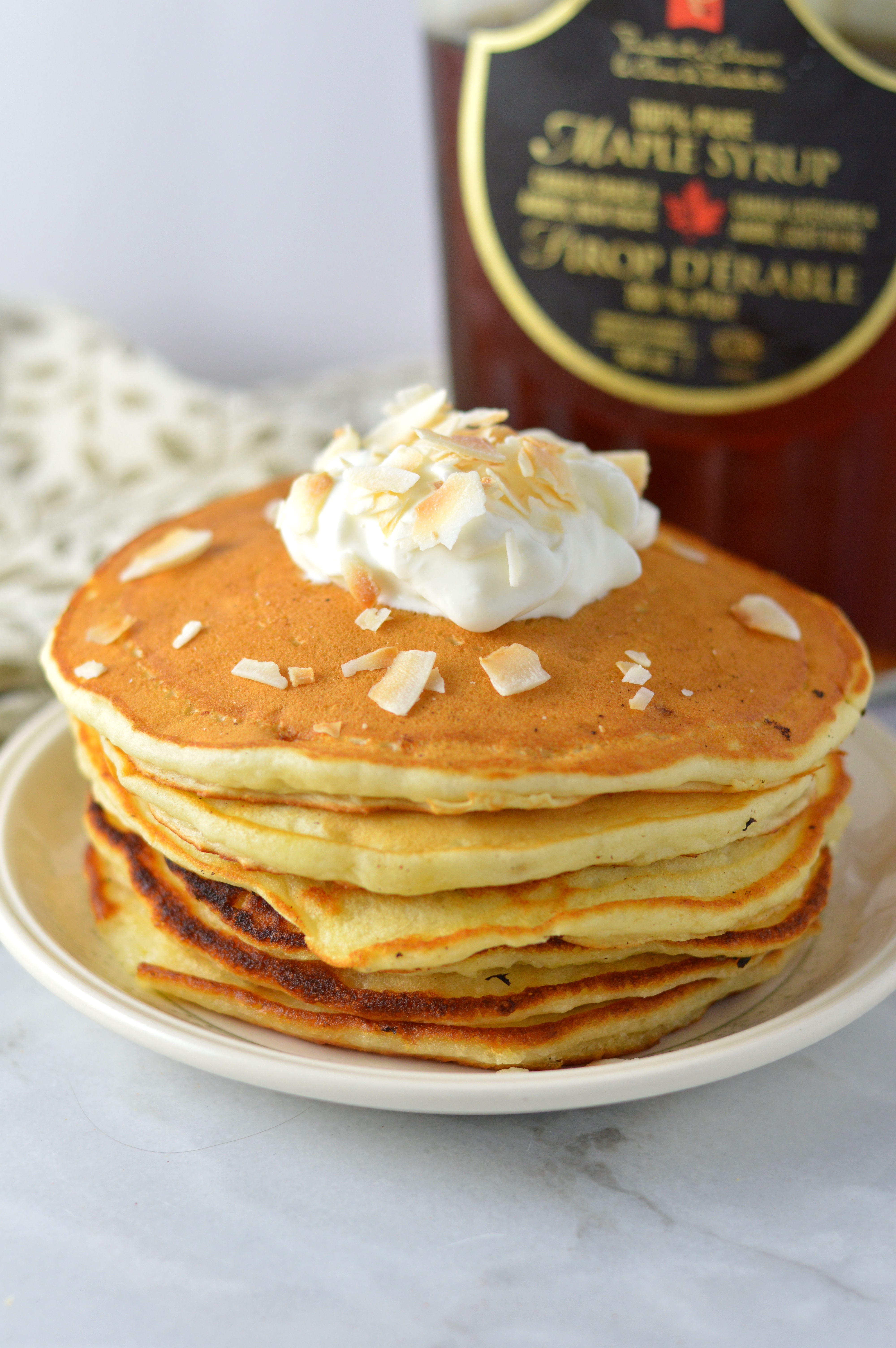 Fluffy and healthy Banana Pancakes recipe that are super easy to make. This quick breakfast idea uses 2 ripe bananas and ingredients you already have in the pantry.