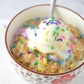 Easy Birthday Cake Oatmeal recipe for a quick and healthy way to celebrate your big day in the morning. Add ice cream if you want to make it extra special!